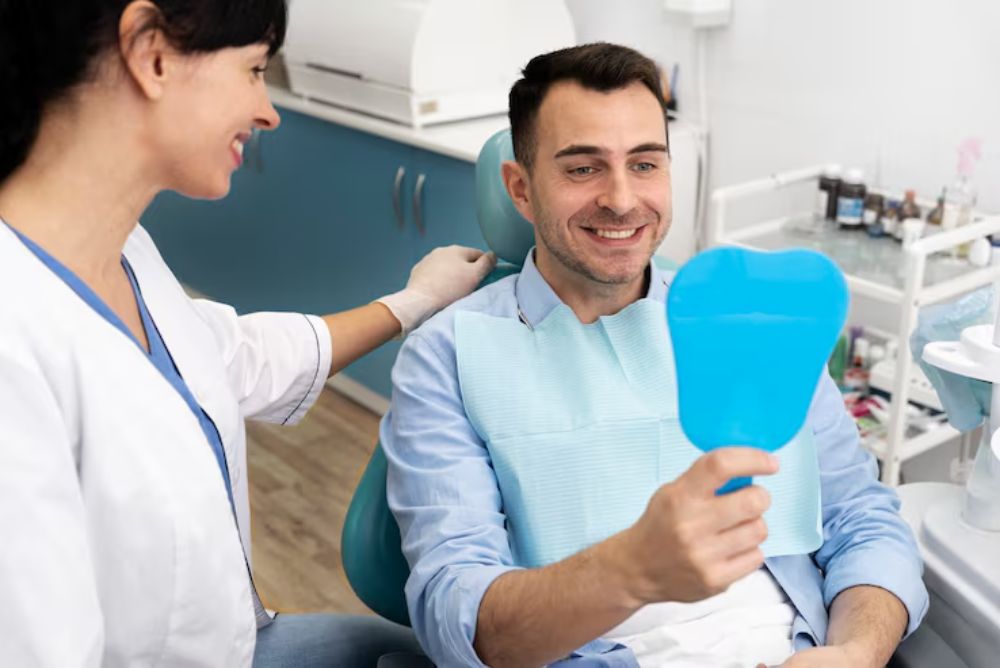 dentist and patient discussing dental implant treatment outcomes